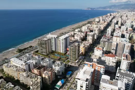 Квартиры в Махмутларе в жилом комплексе в шаге от Средиземного моря